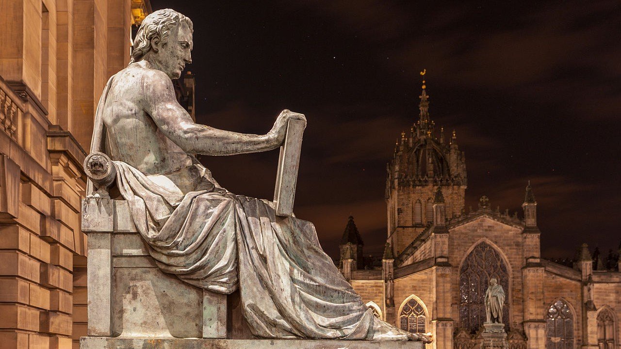 Bronze statue of David Hume locate on the Royal Mile, Edinburgh, United Kingdom.